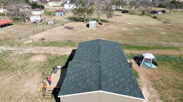 Right side of home showing the new 30 year IKO Dynasty Class 3 shingles in Emerald Green