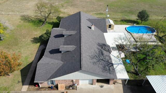 Right side of the home showing the new 30 year IKO Cambridge shingles in Driftwood