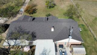 Rear of the home showing the new 30 year IKO Cambridge shingles in Driftwood