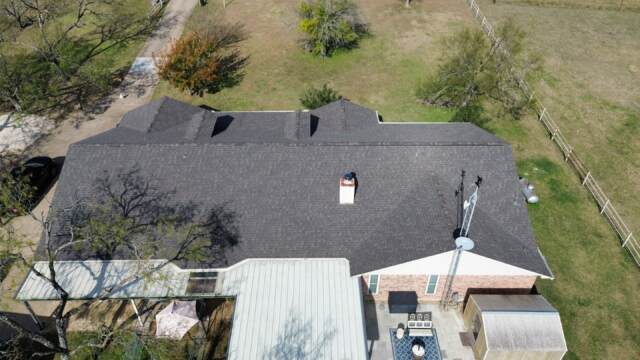 Rear of the home showing the new 30 year IKO Cambridge shingles in Driftwood