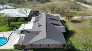 Left side of the home showing the new 30 year IKO Cambridge shingles in Driftwood