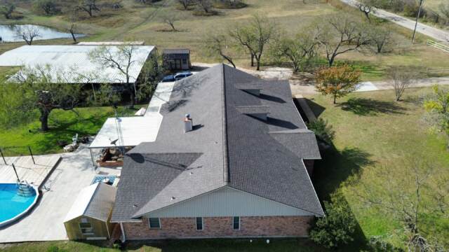 Left side of the home showing the new 30 year IKO Cambridge shingles in Driftwood