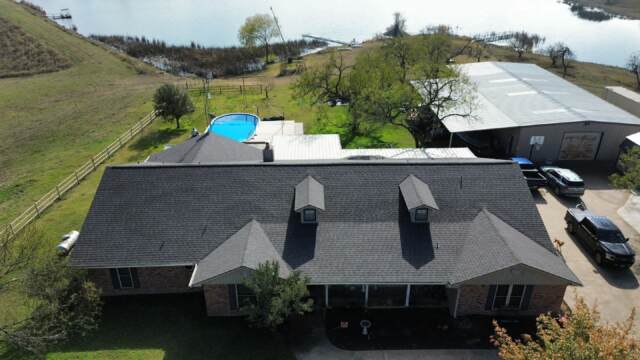 Front of the home showing the new 30 year IKO Cambridge shingles in Driftwood