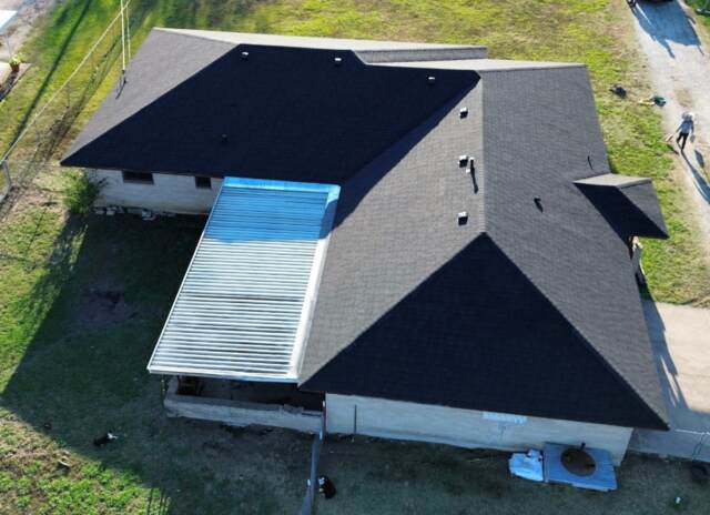 Rear of home showing the new 30 year IKO Dynasty Class 3 Architectural Shingles in Matte Black