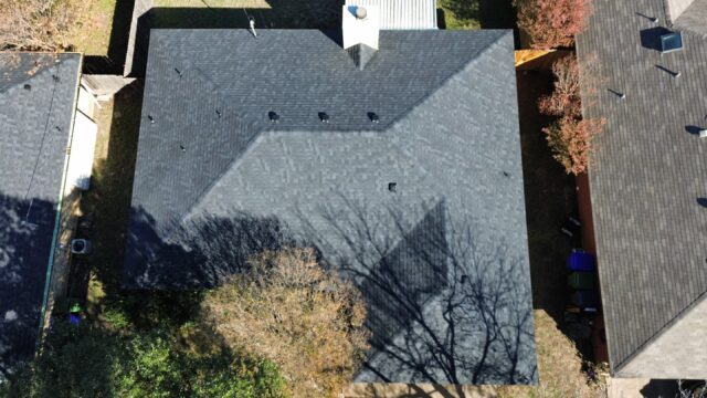 Aerial view of the front of the home showing the new 30 Year IKO Cambridge shingles in Dual Black