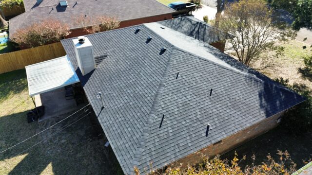 Rear left side of the home showing the new 30 Year IKO Cambridge shingles in Dual Black