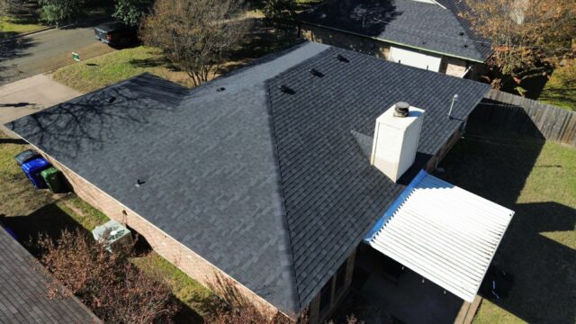 Rear right side of the home showing the new 30 Year IKO Cambridge shingles in Dual Black