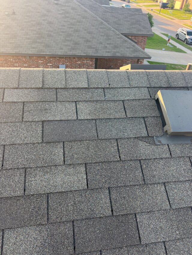 Repairs to wind damaged shingles. Replaced one 3 tab shingle