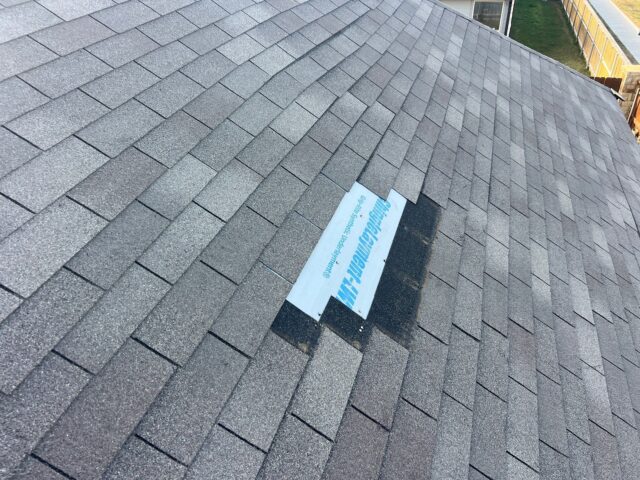 Wind damage to the roof on the right side