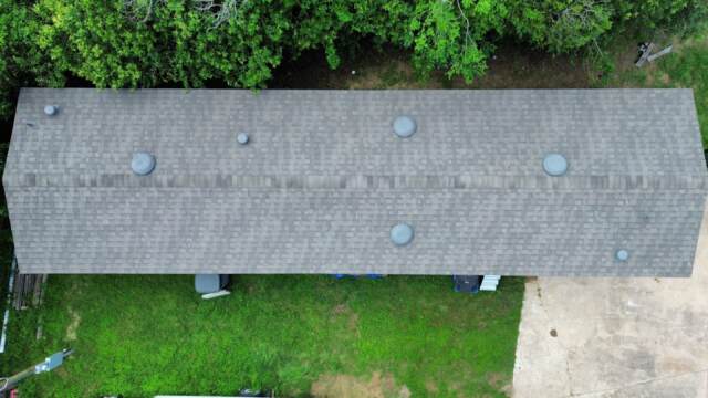 Aerial view of roof from directly overhead showing new IKO Cambridge shingles in Weatherwood