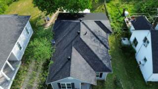 Aerial view of the front of the roof showing new IKO Cambridge shingles in Dual Black