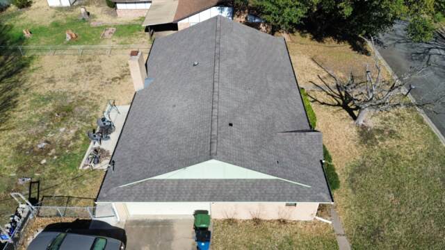 Aerial view of left side of roof showing new IKO Cambridge shingles in Weatherwood