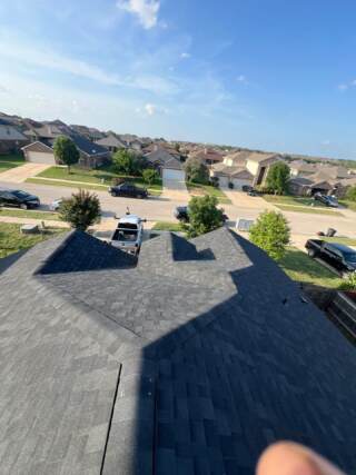 View from the roof of the front left with new 30 year Architectural shingles. Shingles are IKO Cambridge in Dual Black