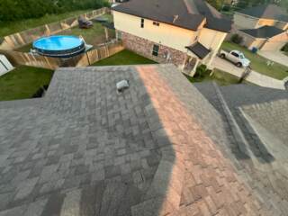 View of the right side of the roof with new 30 year Architectural shingles. Shingles are IKO Cambridge in Weatherwood