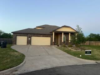 View of the front of the home with new 30 year Architectural shingles. Shingles are IKO Cambridge in Weatherwood