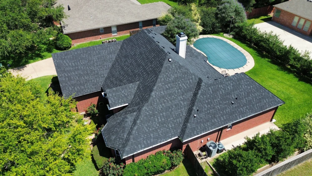 Right side view of the roof showing new architectural shingles by IKO in Granite Black